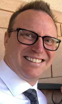 Professional headshot of Jason Marquette